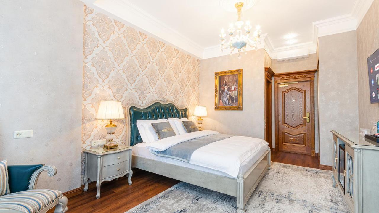 Gregory Boutique Hotel 基希讷乌 外观 照片 A bedroom